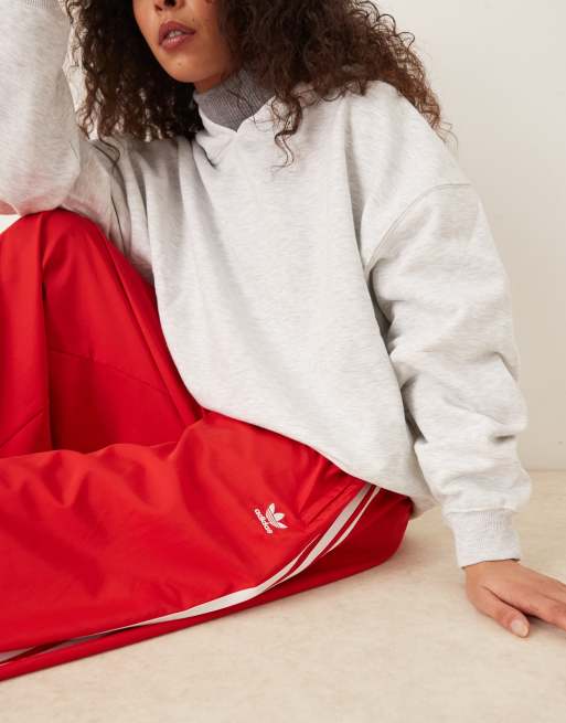 adidas Originals Adicolor wide leg track pants in red
