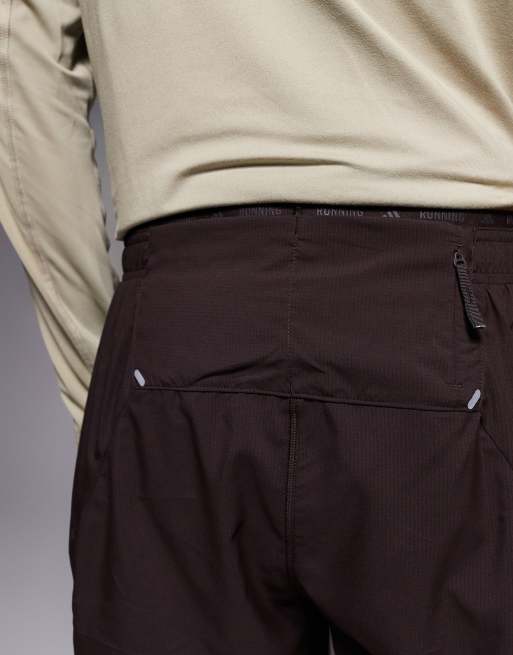 adidas Running adi365 shorts with reflective 3 stripes in brown