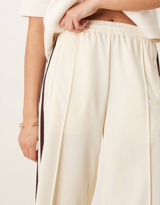adidas Originals Firebird Loose track pants in cream and burgundy