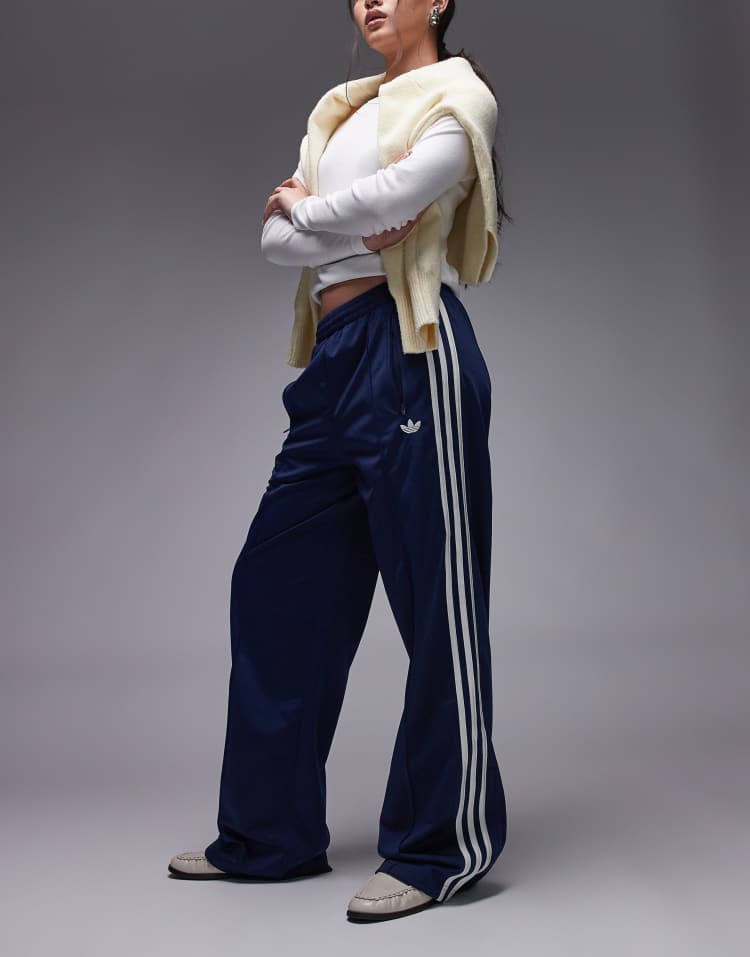 adidas Originals Firebird loose track pants in navy and white