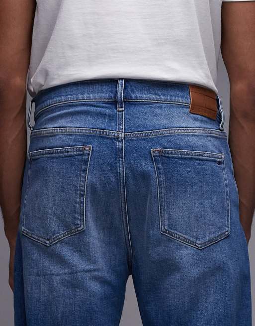 Tommy Jeans Sonny regular tapered jeans in mid wash
