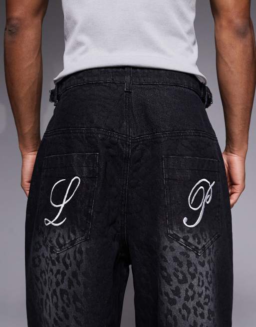 Liquor N Poker viper baggy jeans in black snake print