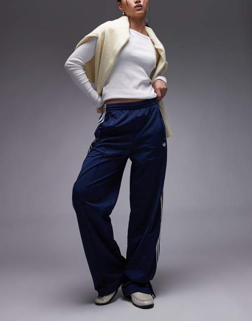 adidas Originals Firebird loose track pants in navy and white