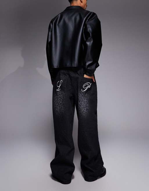 Liquor N Poker viper baggy jeans in black snake print