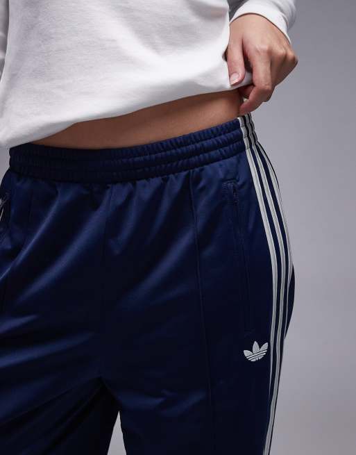 adidas Originals Firebird loose track pants in navy and white