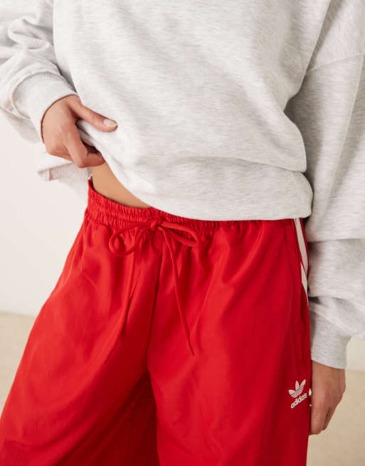 adidas Originals Adicolor wide leg track pants in red