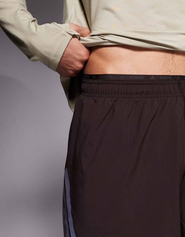 adidas Running adi365 shorts with reflective 3 stripes in brown